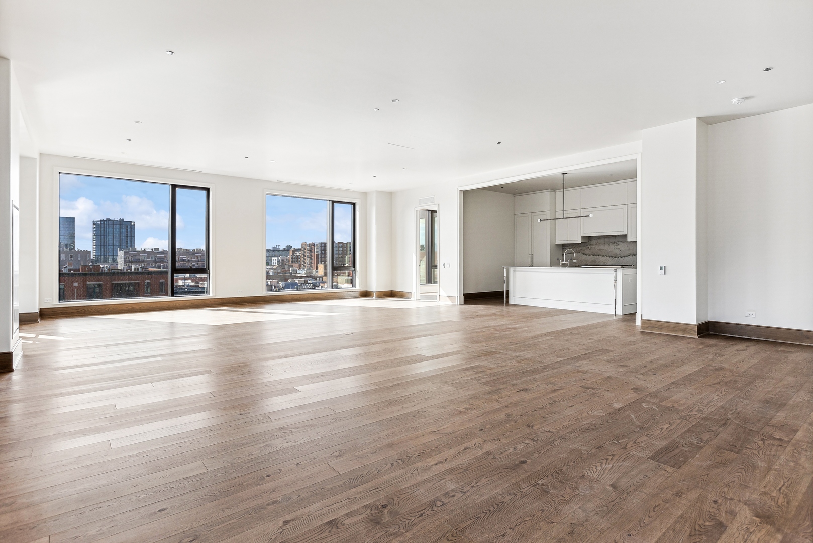 21 North May Street, Unit 601 Chicago, IL 60607 - Photo 24 of 64 a view of a kitchen with a sink and a large window