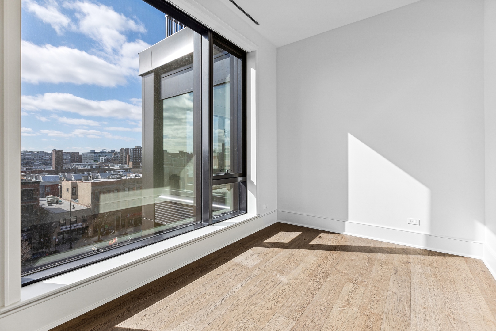 21 North May Street, Unit 601 Chicago, IL 60607 - Photo 51 of 64 a view of an empty room and window