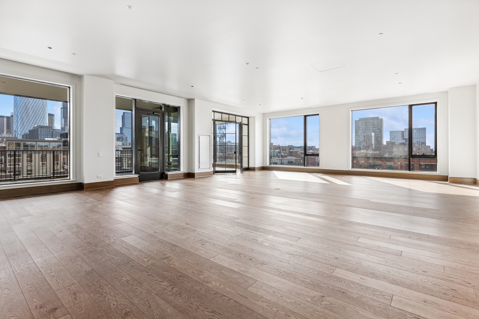 21 North May Street, Unit 601 Chicago, IL 60607 - Photo 6 of 64 a view of a livingroom with furniture wooden floor and a window