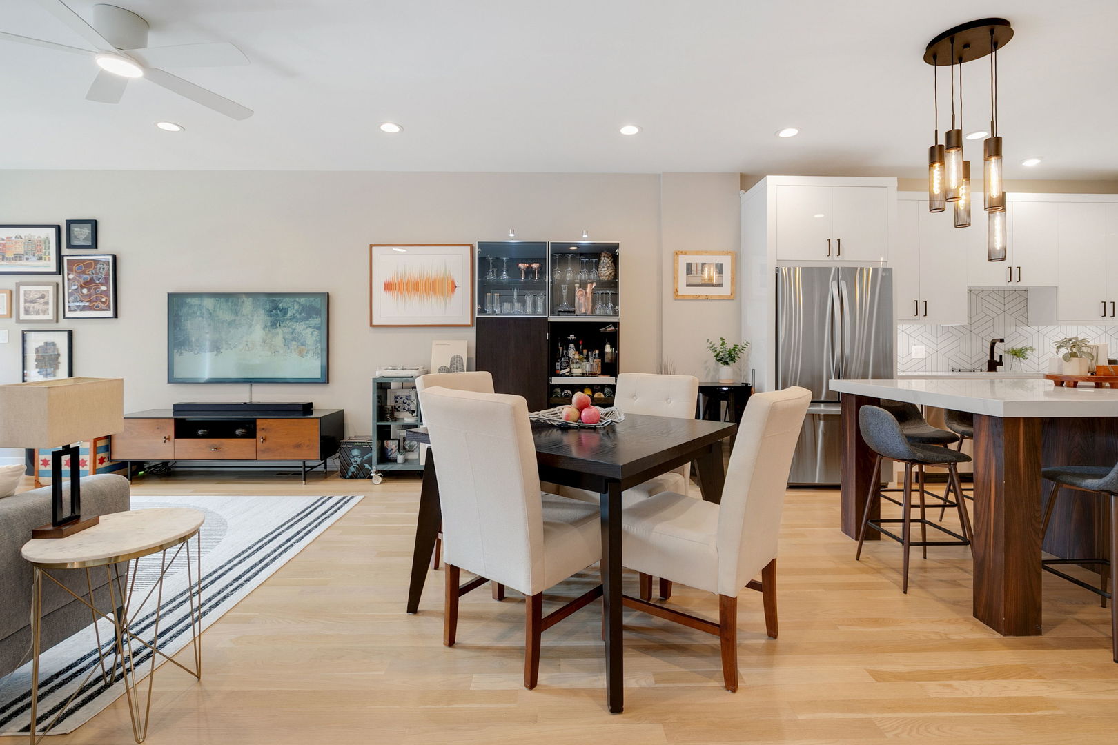 2404 West Moffat Street, Unit 1 Chicago, IL 60647 - Photo 15 of 41 a living room with furniture kitchen view and a table