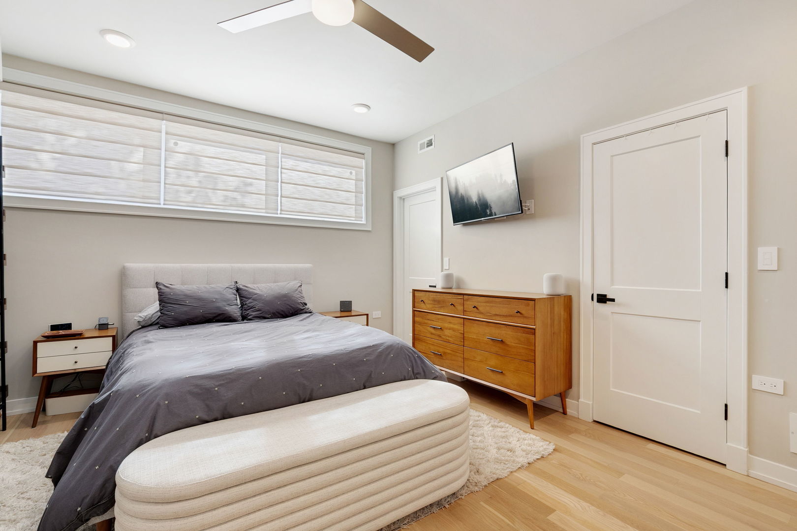 2404 West Moffat Street, Unit 1 Chicago, IL 60647 - Photo 21 of 41 a bedroom with a bed and a window