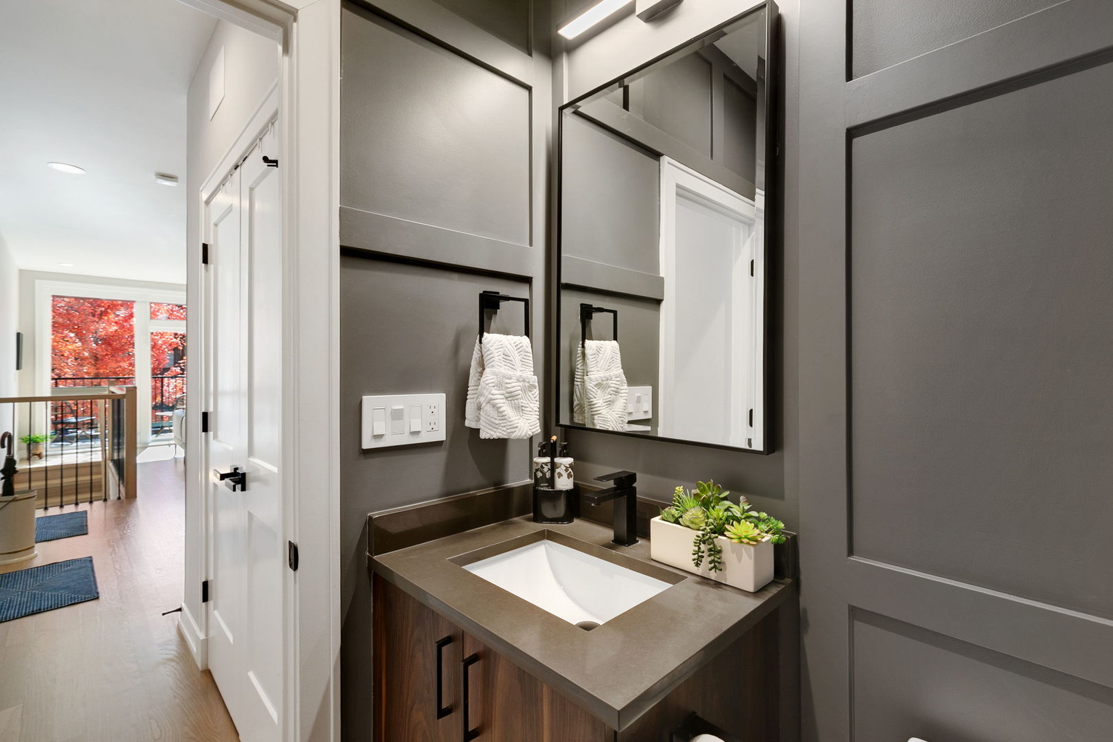 2404 West Moffat Street, Unit 1 Chicago, IL 60647 - Photo 34 of 41 a bathroom with a sink and a mirror
