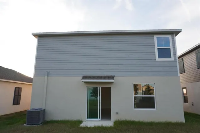 a front view of a house with garage