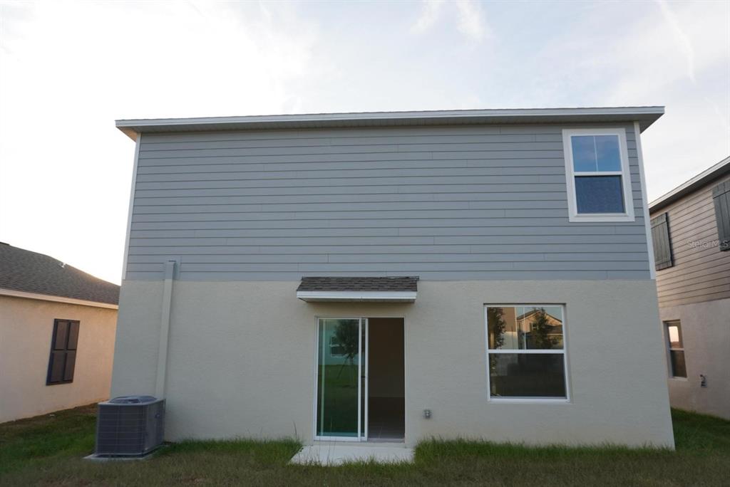 3779 Bergamot Boulevard Lake Alfred, FL 33850 - Photo 16 of 25 a front view of a house with garage