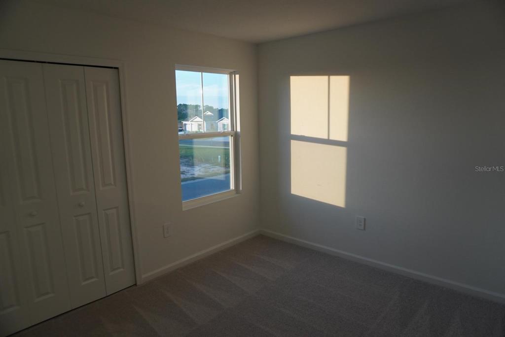 3779 Bergamot Boulevard Lake Alfred, FL 33850 - Photo 6 of 25 an empty room with windows