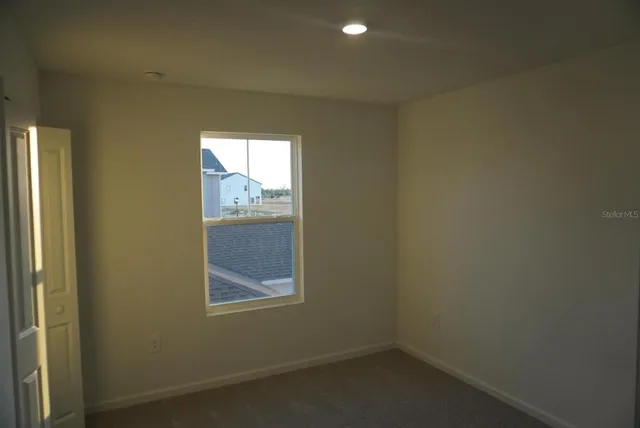 an empty room with a window
