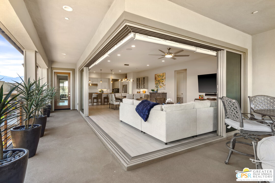 204 Retreat Circle Palm Desert, CA 92260 - Photo 2 of 60 a view of living room with furniture and a potted plant