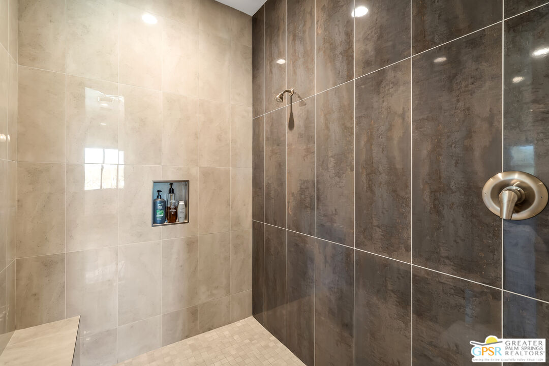 204 Retreat Circle Palm Desert, CA 92260 - Photo 42 of 60 a bathroom with a shower