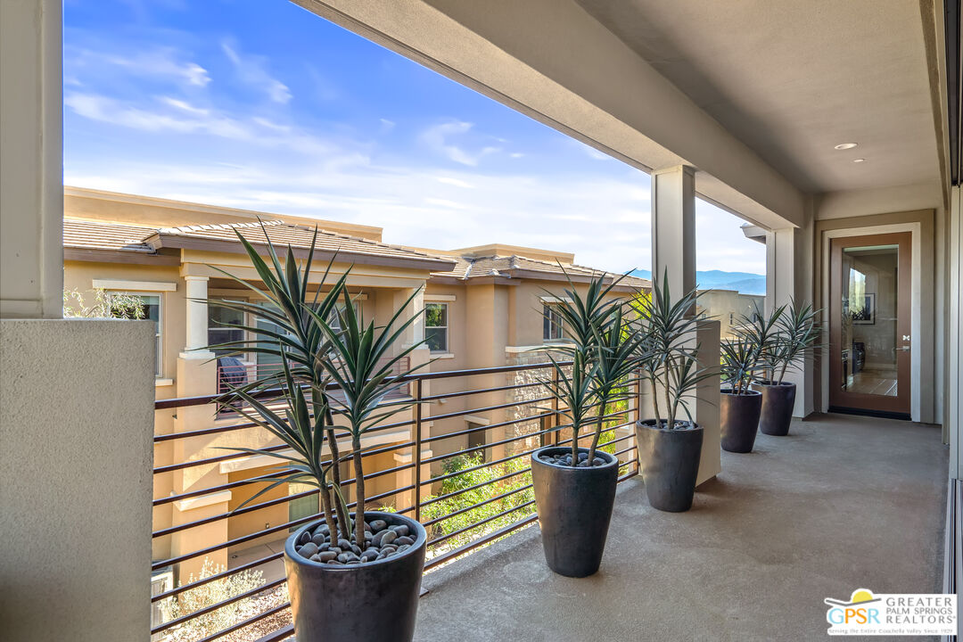 204 Retreat Circle Palm Desert, CA 92260 - Photo 53 of 60 a front view of a house with outdoor seating
