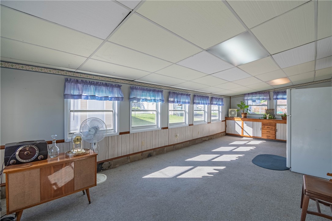 2287 West Cushing Street Decatur, IL 62526 - Photo 7 of 23 a room with furniture and a large window
