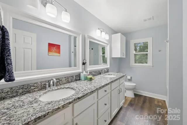 a bedroom with a bed and a table