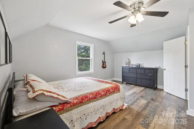 a view of entryway with stairs and wooden floor