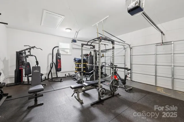 a side view of a house with a fence