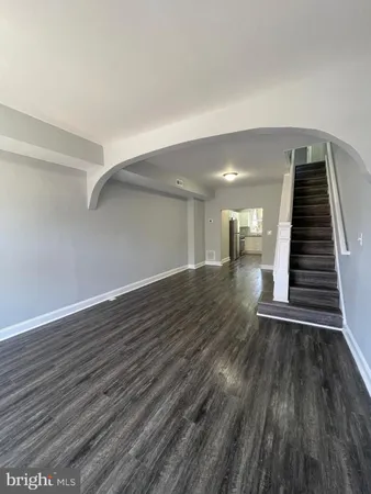 a view of entryway with wooden floor