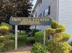 a sign on the side of a building