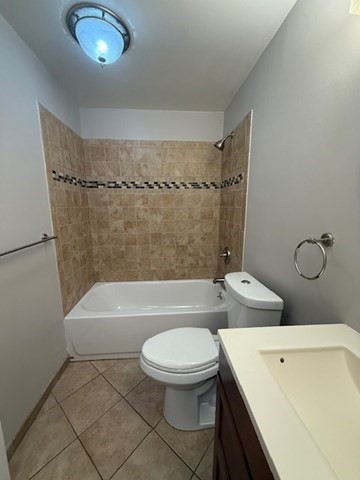 5455 North Main Street, Unit 12A Fall River, MA 02720 - Photo 11 of 16 a bathroom with a toilet a sink and a bathtub