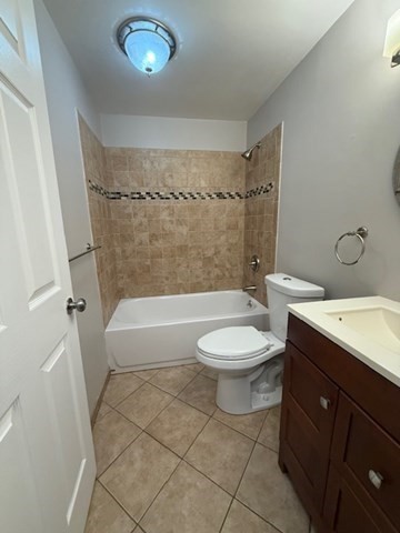 5455 North Main Street, Unit 12A Fall River, MA 02720 - Photo 12 of 16 a bathroom with a toilet a sink and a bathtub