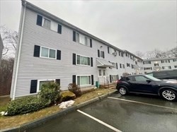 5455 North Main Street, Unit 12A Fall River, MA 02720 - Photo 2 of 16 a view of a car parked in front of a house