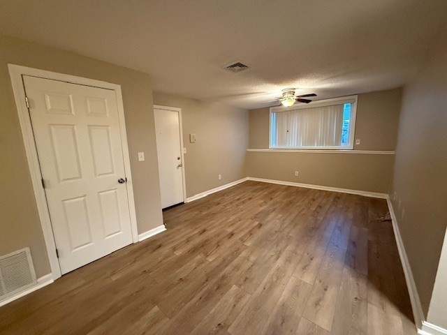 5455 North Main Street, Unit 12A Fall River, MA 02720 - Photo 6 of 16 a view of livingroom with hardwood floor and hallway