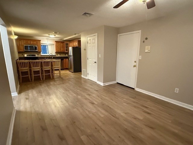 5455 North Main Street, Unit 12A Fall River, MA 02720 - Photo 8 of 16 a view of kitchen with furniture and refrigerator