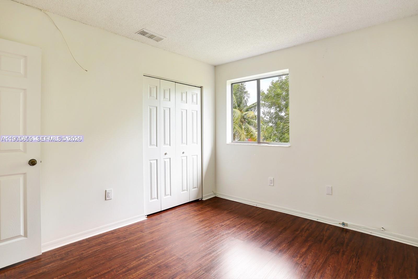 7515 Southwest 164th Court Miami, FL 33193 - Photo 26 of 33 Bedroom 3