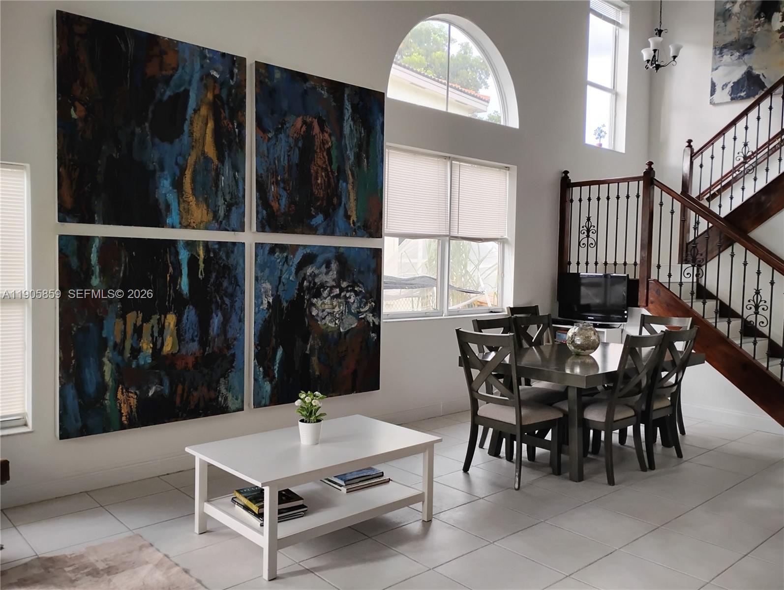 7515 Southwest 164th Court Miami, FL 33193 - Photo 7 of 22 a dining room with furniture and window