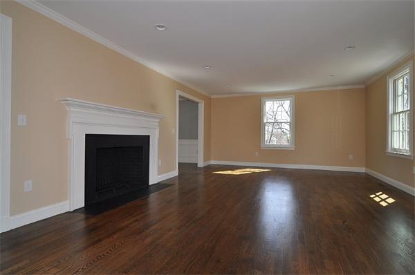 91 Royalston Road Wellesley, MA 02481 - Photo 8 of 21 a view of an empty room with wooden floor and a window