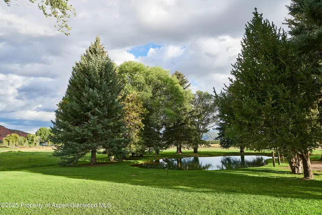 a view of an ocean from a mountain
