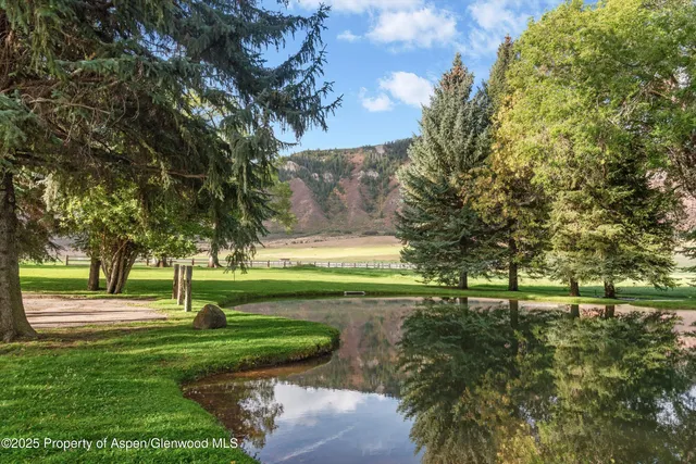 a view of a lake with a mountain in the background