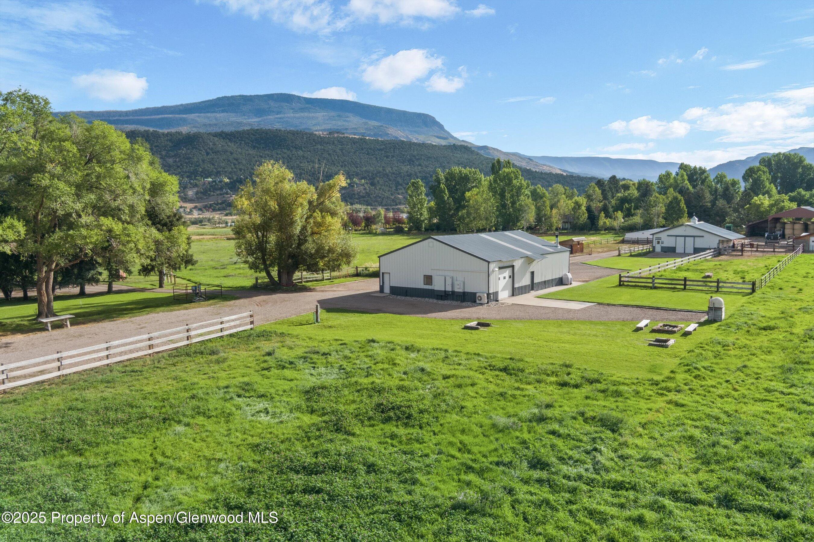 2700 Emma Road Basalt, CO 81621 - Photo 6 of 36 a view of a house with a yard