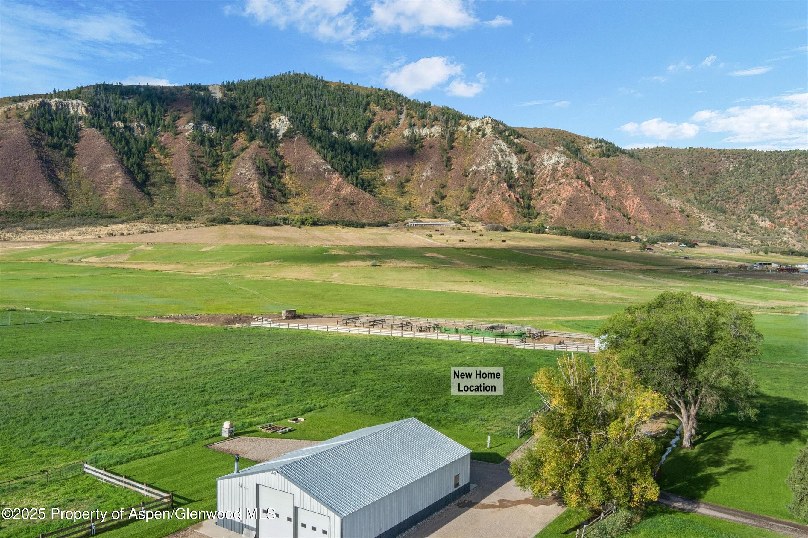2700 Emma Road Basalt, CO 81621 - Photo 7 of 36 a view of a lake with a mountain in the background