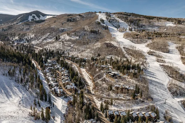 a view of mountains and valleys