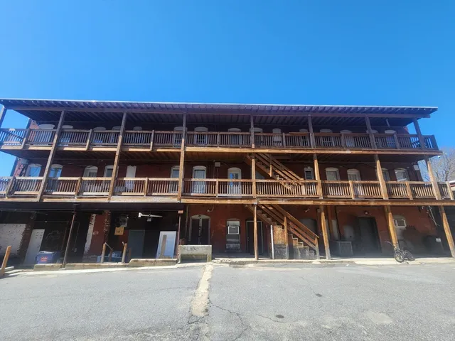 a front view of a house with a balcony