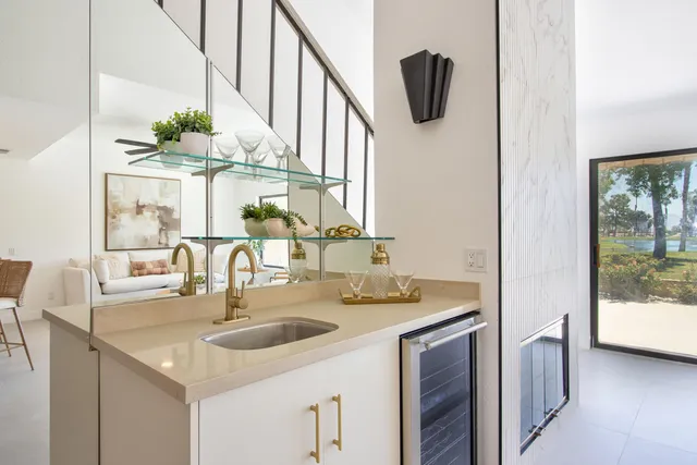 a bedroom with a bed and lamp