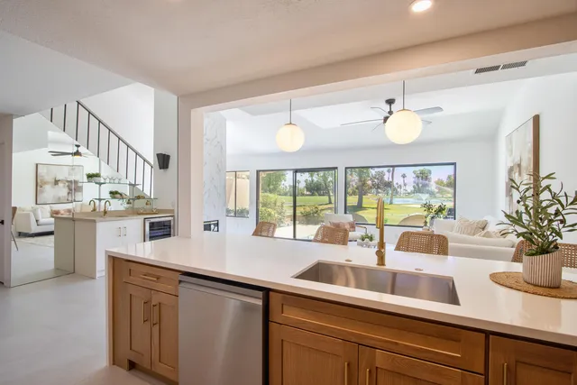 a view of a swimming pool with a yard