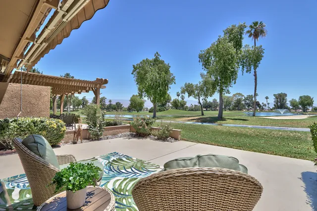 a view of a lake with a yard