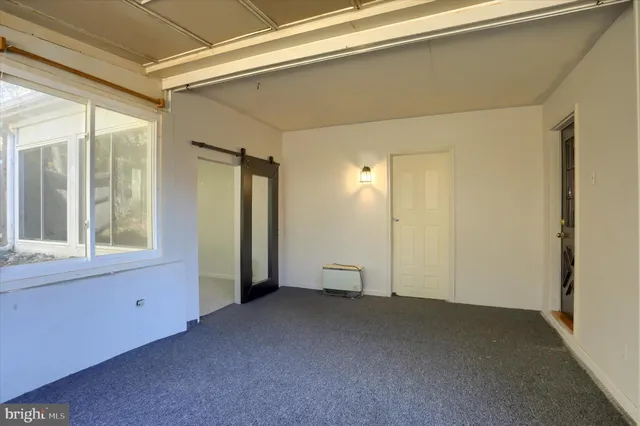 an empty room with windows