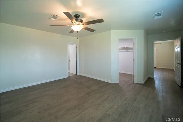 a view of an empty walk in closet