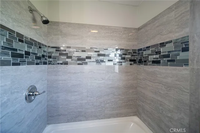 an empty room with closet area