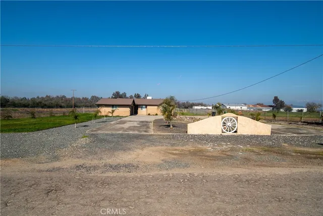 a view of a road with houses