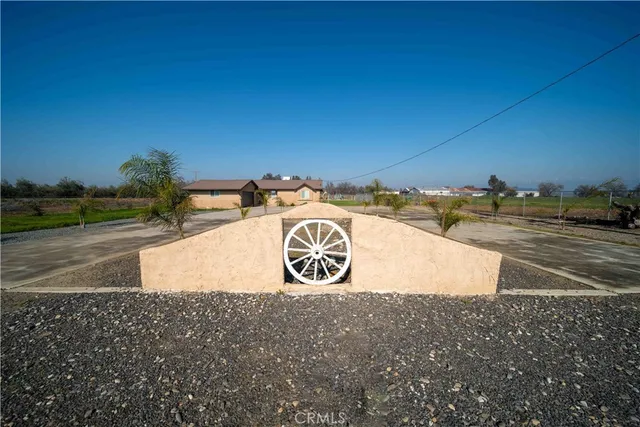 a view of a street with trees in the background