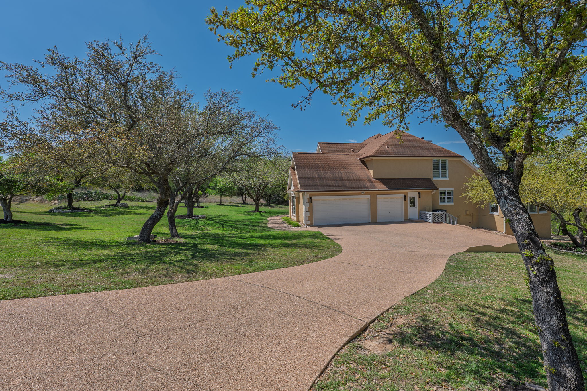 4424 Lago Viento Austin, TX 78734 - Photo 35 of 38 The home has a 3 car garage and plenty of room for friends and family to park.