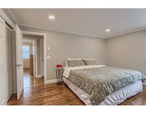 15 Skyline Drive Rutland, MA 01543 - Photo 16 of 30 a bedroom with a bed and wooden floor