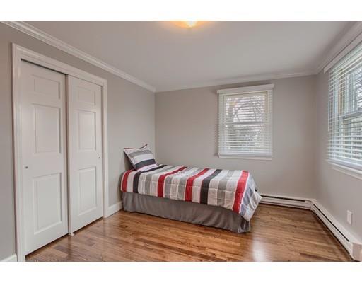 15 Skyline Drive Rutland, MA 01543 - Photo 17 of 30 a bed sitting in a bedroom next to a window