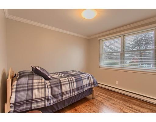 15 Skyline Drive Rutland, MA 01543 - Photo 18 of 30 a bedroom with a bed window and wooden floor
