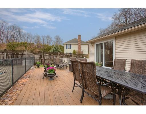 15 Skyline Drive Rutland, MA 01543 - Photo 26 of 30 a view of a roof deck with table and chairs couches with wooden floor