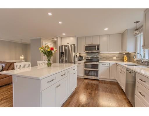 15 Skyline Drive Rutland, MA 01543 - Photo 5 of 30 a kitchen with kitchen island white cabinets appliances and sink