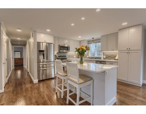 15 Skyline Drive Rutland, MA 01543 - Photo 6 of 30 a kitchen with stainless steel appliances kitchen island granite countertop a refrigerator and a sink