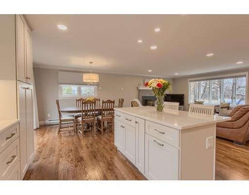 15 Skyline Drive Rutland, MA 01543 - Photo 7 of 30 a kitchen with stainless steel appliances kitchen island granite countertop a sink and cabinets