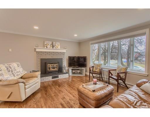 15 Skyline Drive Rutland, MA 01543 - Photo 10 of 30 a living room with furniture a large window and a fireplace